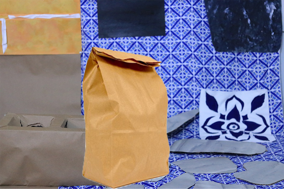 A stuffed brown paper bag sits on the floor of an old kitchen. The kitchen is made of paper and fabric. All it’s pieces straddle the present and the past with cinder block, brick, stones, and Portuguese ceramic tiles. 