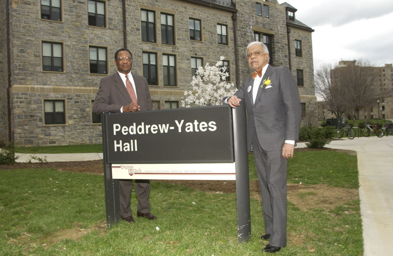 Peddrew (right) and Yates (left) in front of Peddrew-Yates Hall