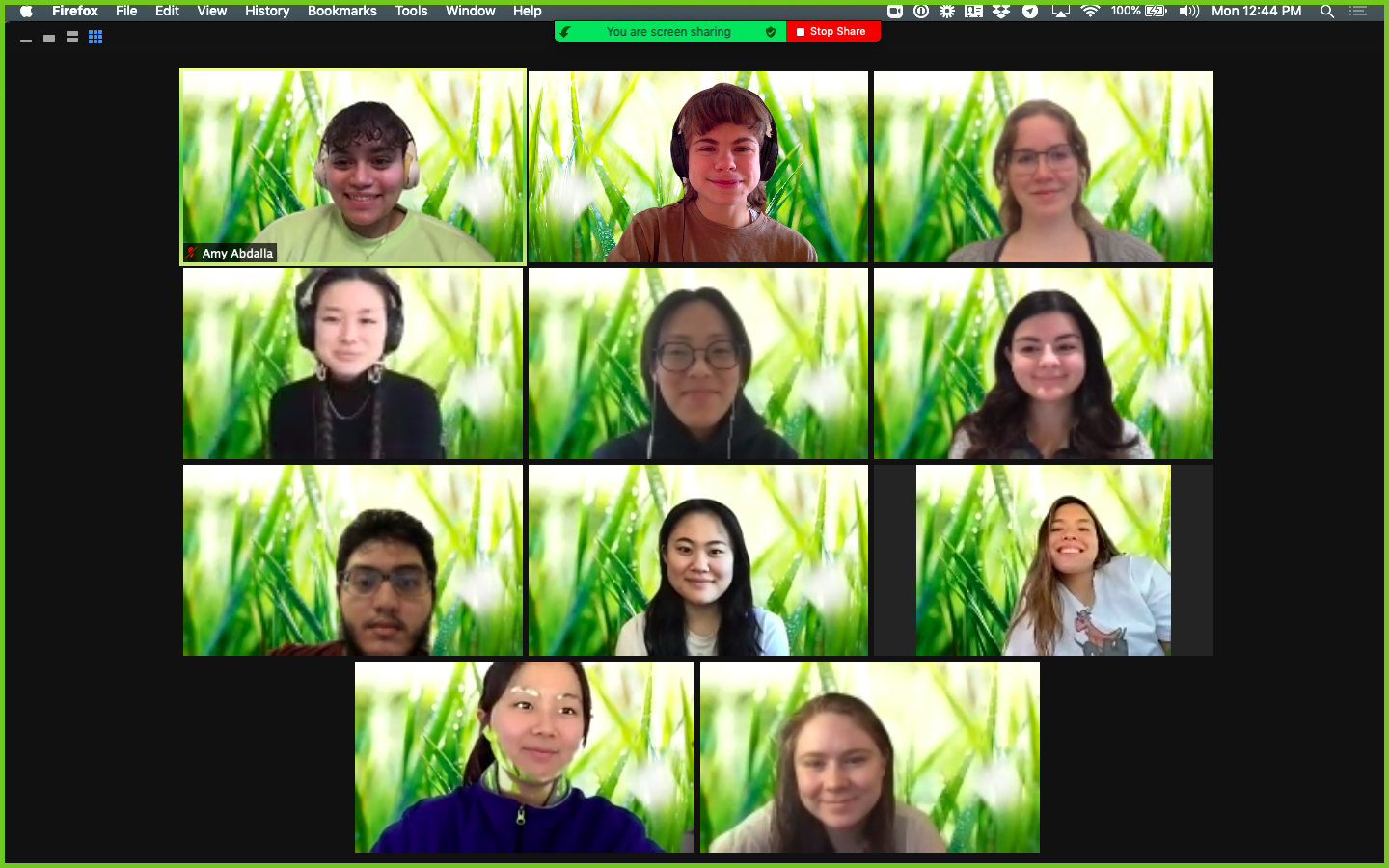 A screenshot of us on our last day in Zoom, you see 10 rectangles of everyone smiling, with springtime grass in the background