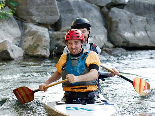 image of a worried/excited man about to enter rapids